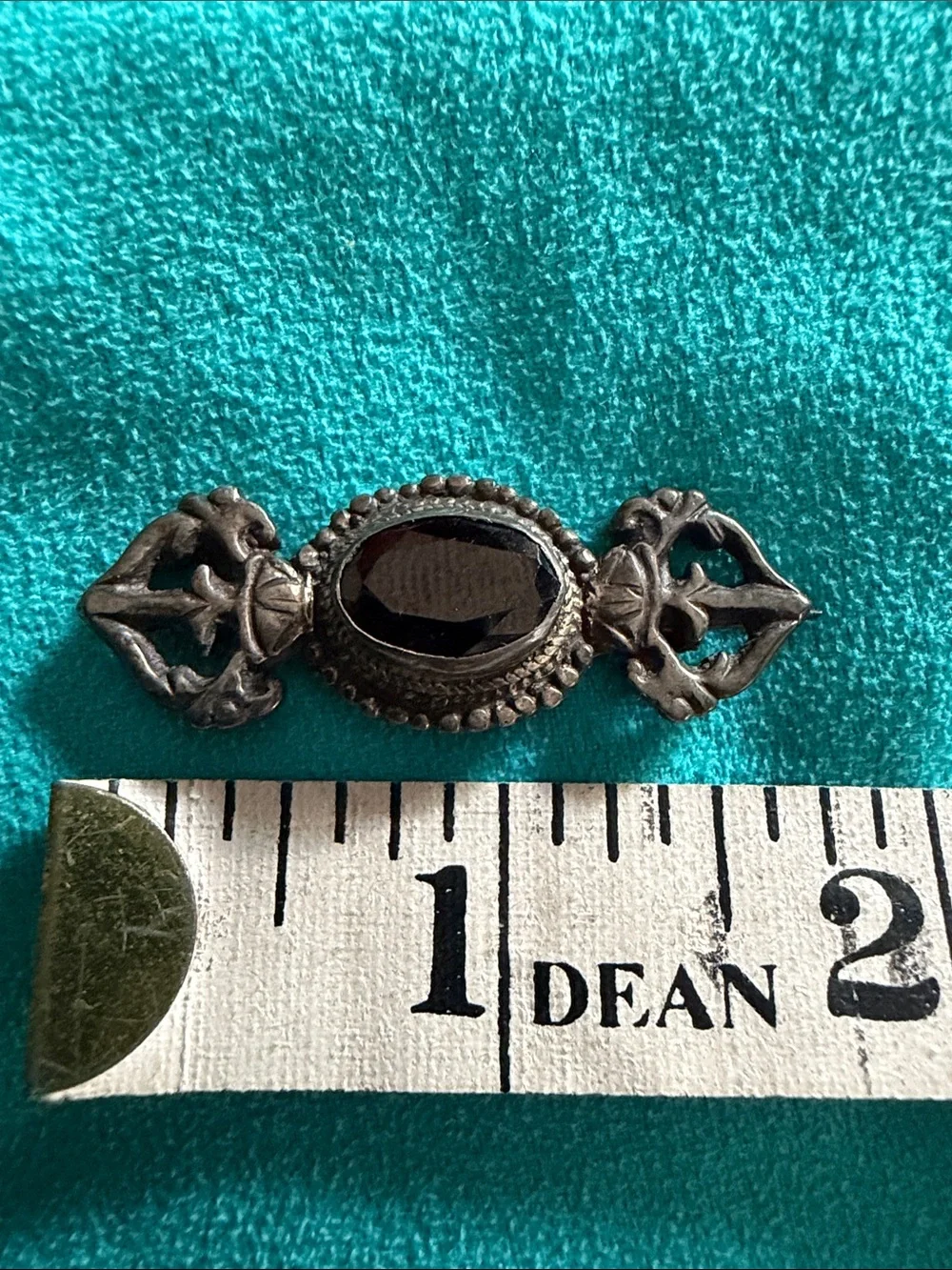 Vintage silver and garnet brooch